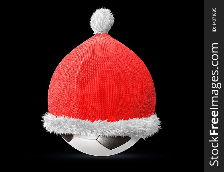 Santa hat on a soccer ball isolated on black background