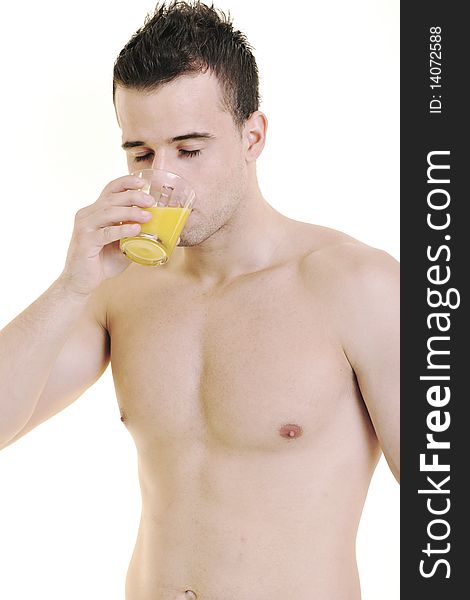 Young fit man dringing orange juice isolated on white. Young fit man dringing orange juice isolated on white