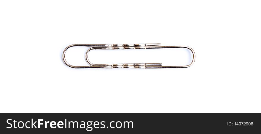 Single metal clip isolated on white background. Single metal clip isolated on white background.