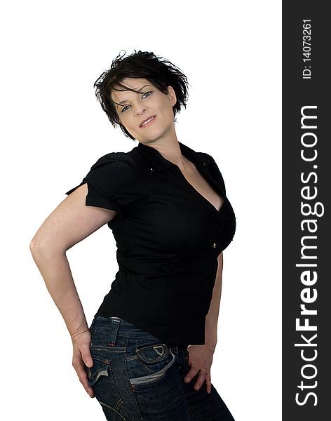 Pretty brunette woman wearing a black top and jeans over white background. Pretty brunette woman wearing a black top and jeans over white background.