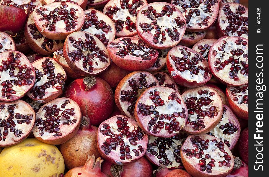 Bloody fresh pomegranates on Istanbul street market. Bloody fresh pomegranates on Istanbul street market