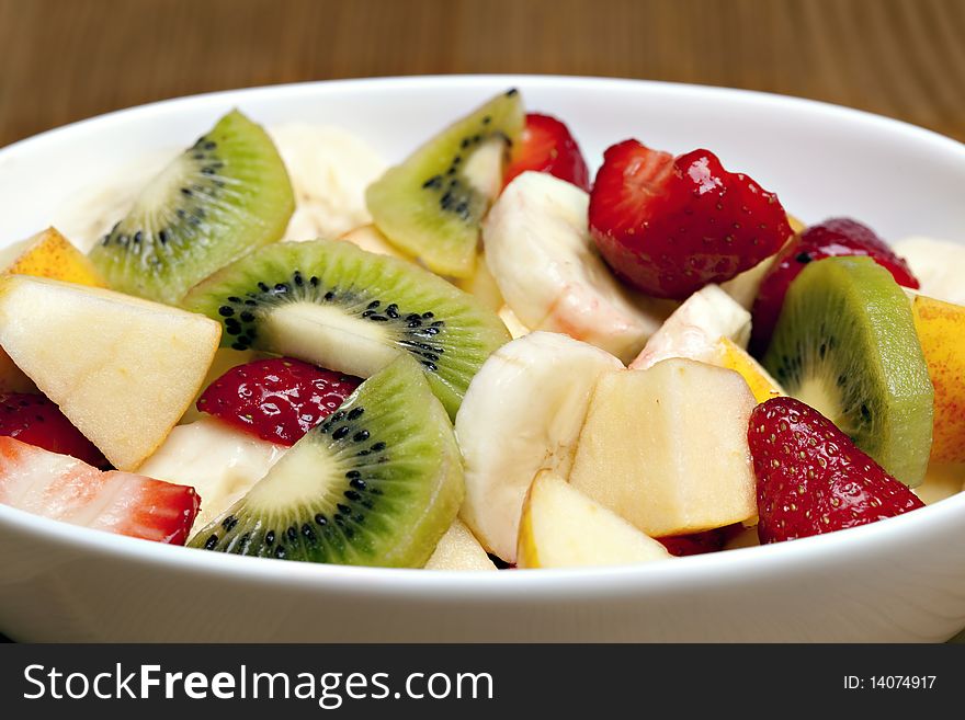 Delicious fresh fruit salad in bowl