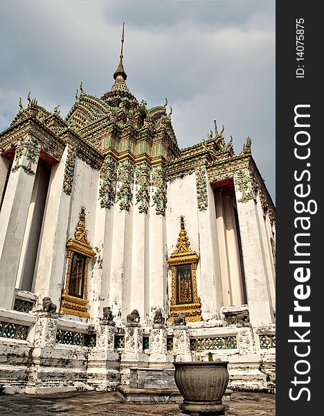 Ancient buddhist temple on cloudy day, HDR image, Bangkok,Thailand