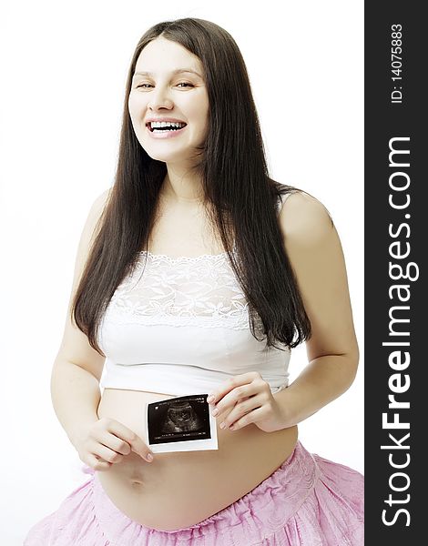 Pregnant Woman With A Photograph Of Ultrasound.