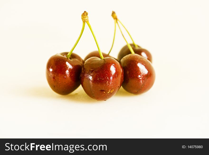 Picture of a bunch of fresh cherries over white background. Picture of a bunch of fresh cherries over white background.