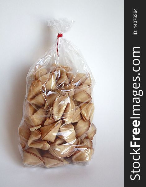 Plastic bag of fortune cookies with red chuch chunchy dessert desserts inspiration inspire sweet enlightning culture surpise