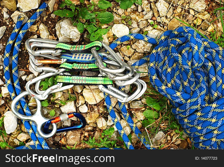 Blue climbing rope and carabiners. Blue climbing rope and carabiners