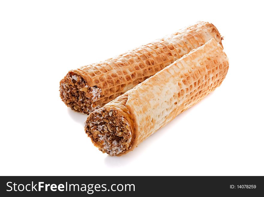 Wafer rolls stuffed by cream isolated on white background. Wafer rolls stuffed by cream isolated on white background