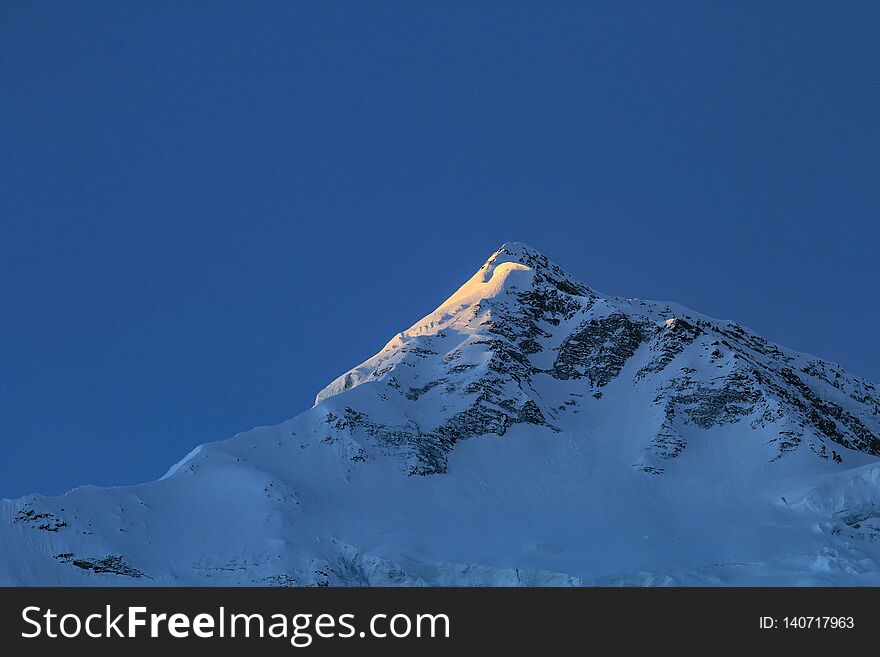 Peak of Bahara Shikhar, mountain of the Annapurna Range in snow