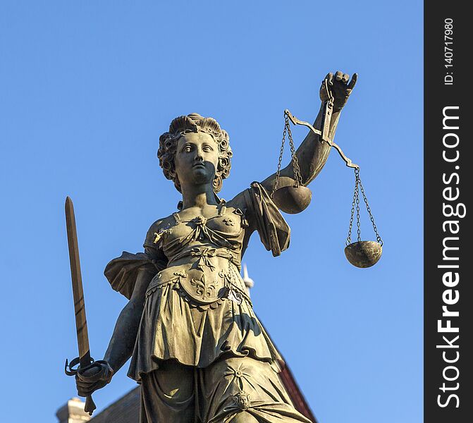 Statue of Lady Justice in front of the Romer in Frankfurt