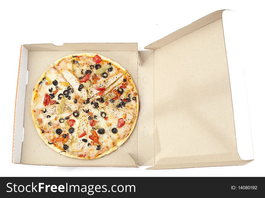 Tasty pizza in a takeaway package. Tasty pizza in a takeaway package