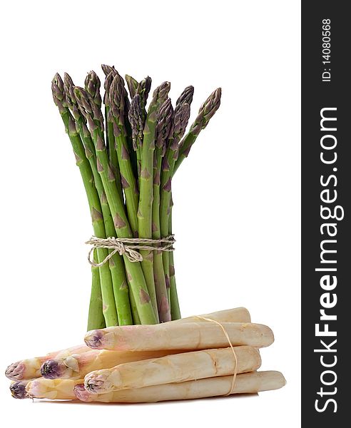 An isolated still life of green and white asparagus. An isolated still life of green and white asparagus