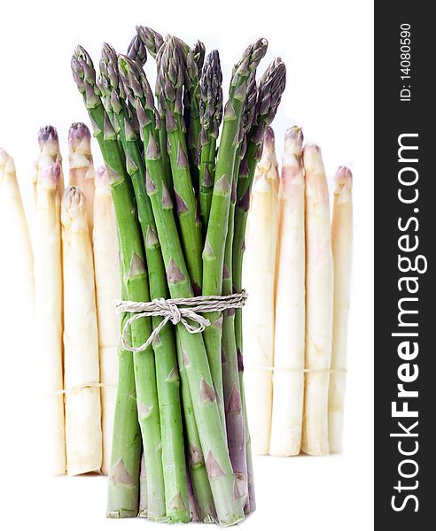 An isolated still life of green and white asparagus. An isolated still life of green and white asparagus