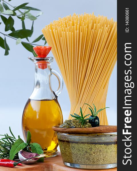 Authentic pesto sauce with its ingredients and Spaghetti. Authentic pesto sauce with its ingredients and Spaghetti.