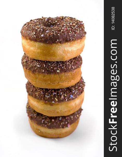 Stack Of Doughnuts Over White