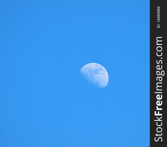 Moon at blue sky during afternoon