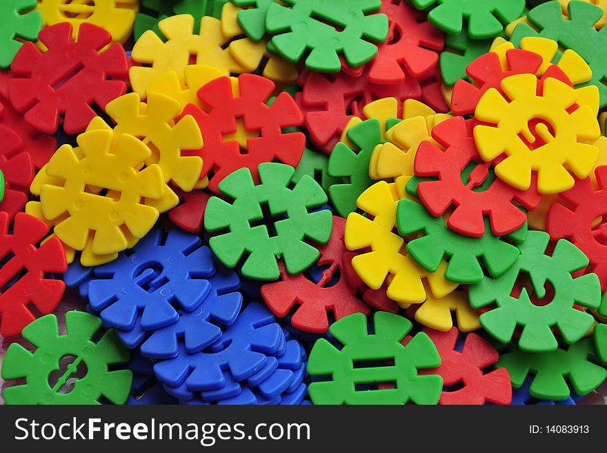 Plastic wheel toys in bright colors