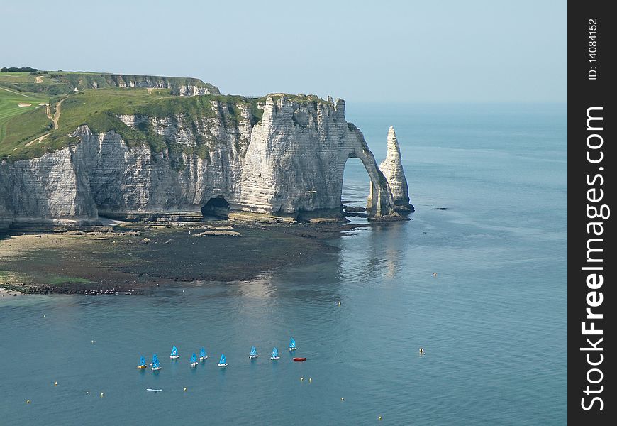 White cliffs and natural arch on the coast of France near the town of Etretat in Normandy