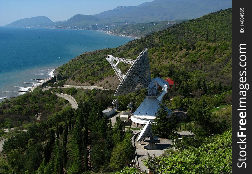 The satellite aerial of tracking at picturesque coast of the black sea. The satellite aerial of tracking at picturesque coast of the black sea.