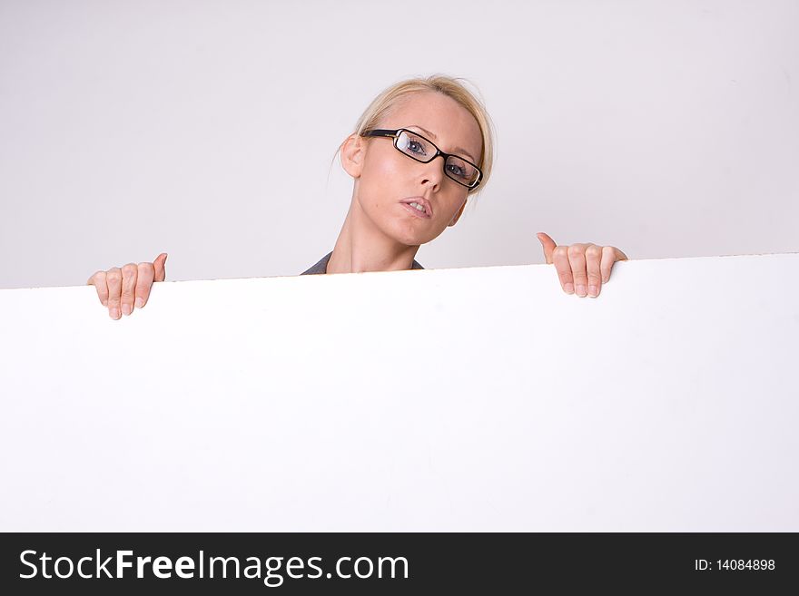 Businesswoman holding blank sign isolated on white. Businesswoman holding blank sign isolated on white