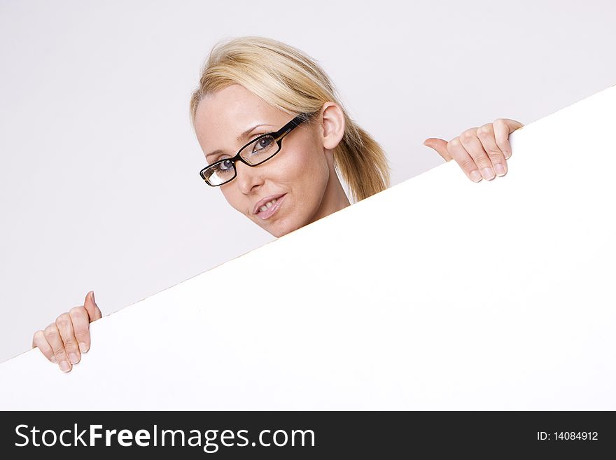 Businesswoman holding blank sign isolated on white. Businesswoman holding blank sign isolated on white