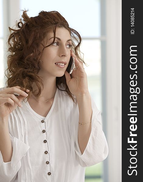 Portrait of young beautiful woman with mobile phone. Portrait of young beautiful woman with mobile phone