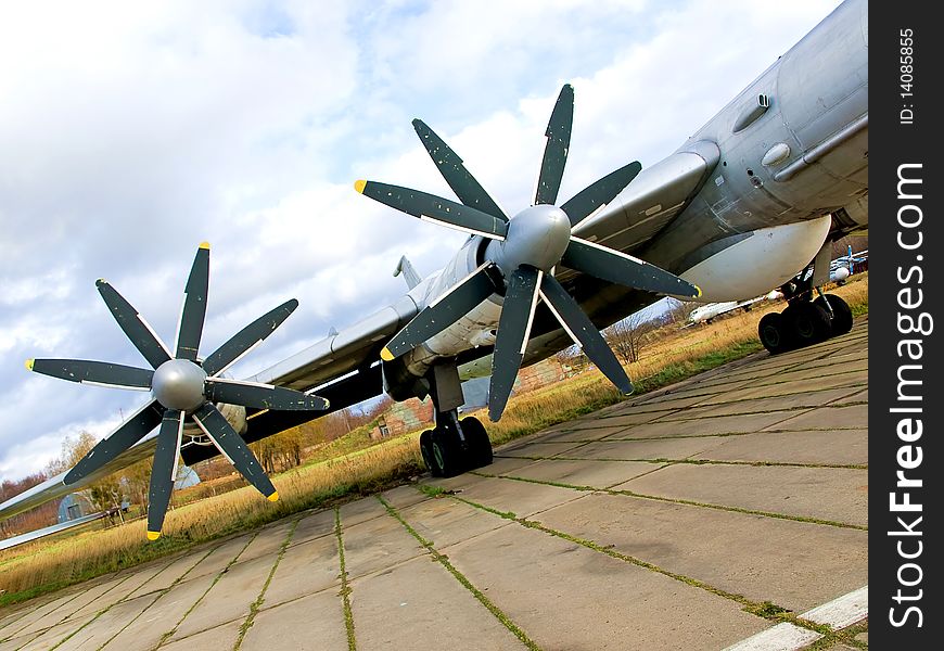 Wing of military plane with propellers