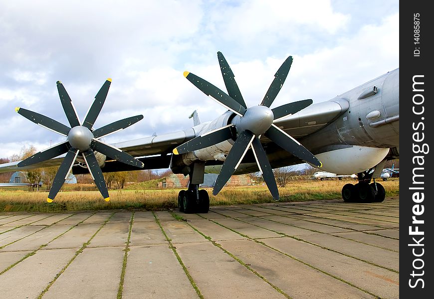 Wing of military plane with propellers