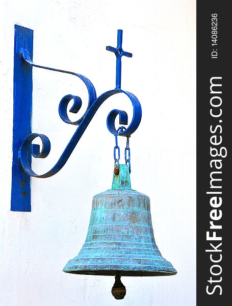 The Church Bell On A White Wall