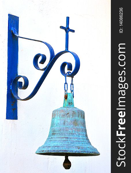 The bell on the wall of the Greek Orthodox Capernaum on the Sea of Galilee. The bell on the wall of the Greek Orthodox Capernaum on the Sea of Galilee