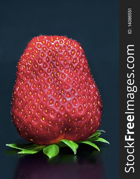 Close-up of a strawberry Italian, on a black background