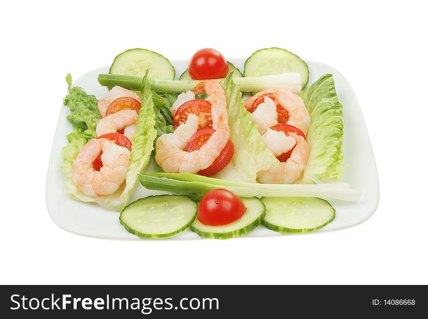 Prawn salad on a plate isolated against white