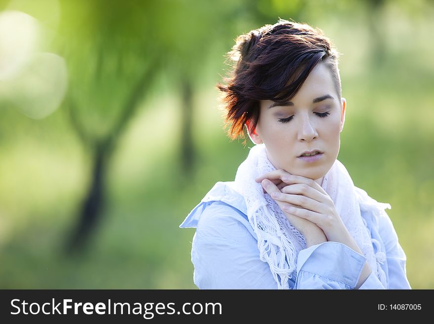 Young girl in emotional gesture with eyes closed. Young girl in emotional gesture with eyes closed.