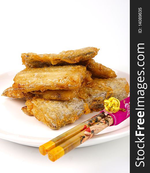 Fresh fried Conger fish. On a plate. Close up on white background