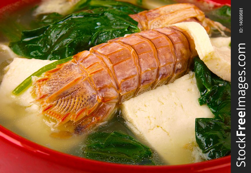 Traditional Chinese langoustine soup. Close up.