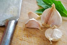 Fresh Garlic With Knife Royalty Free Stock Photos