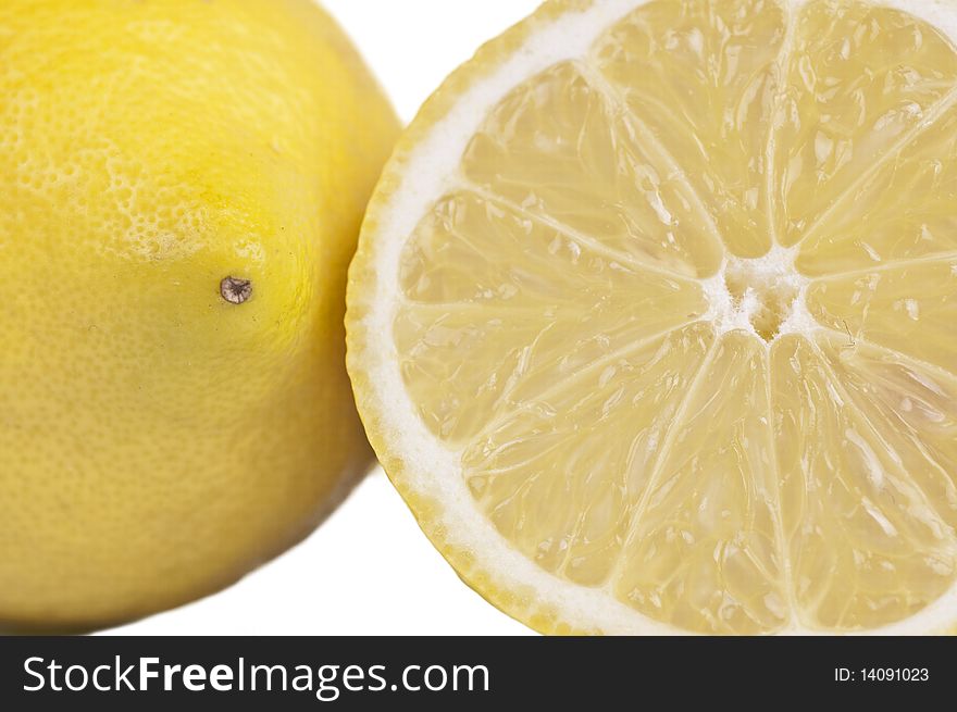 Close up of lemon and lemon slice. Close up of lemon and lemon slice