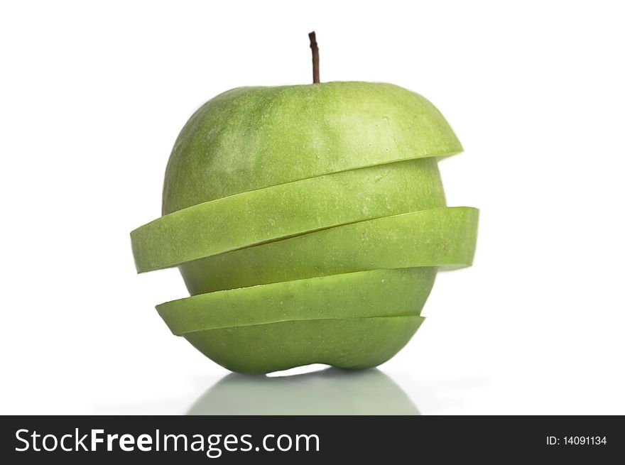 Sliced Granny  Smith Apple with Pedicel and with clipping path. Sliced Granny  Smith Apple with Pedicel and with clipping path