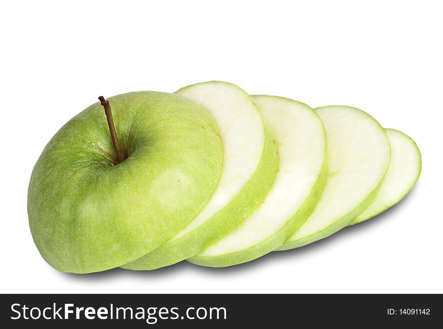 Sliced green apple isolated on white background with clipping path. Sliced green apple isolated on white background with clipping path.