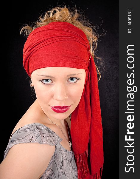 Portrait of a young girl in red color. Portrait of a young girl in red color