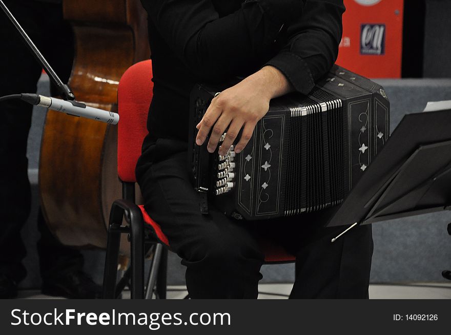 Bandoneon player at a concert