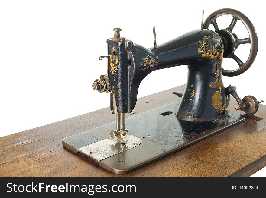 Old sewing machine , sewing-machine  isolated on a white background with cliping path.