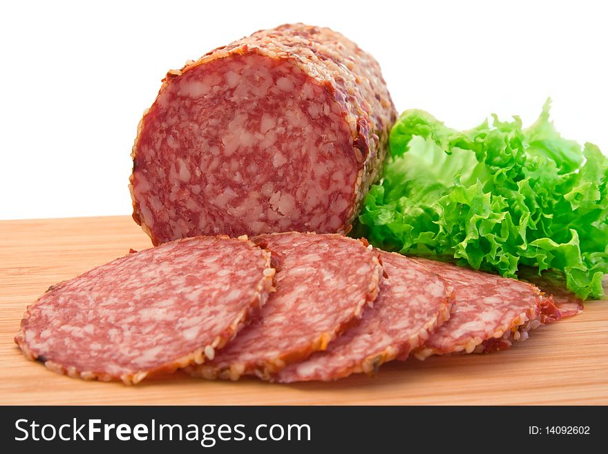 Slices of salami and lettuce