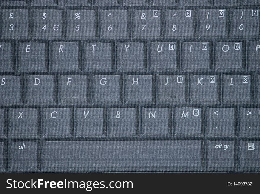 Laptop keyboard with textured surface