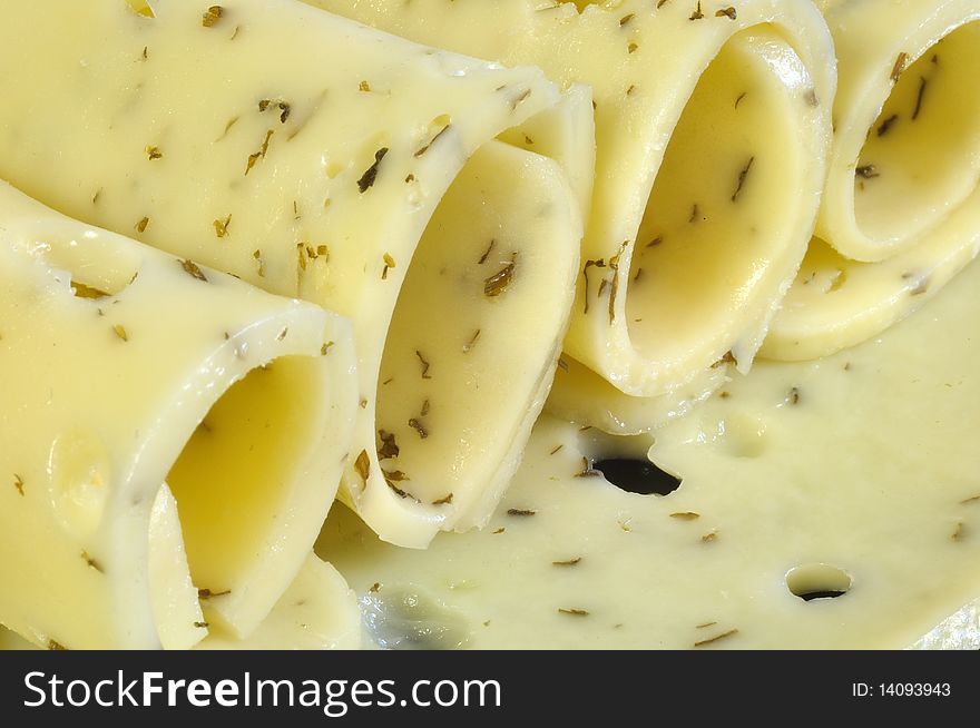Four slices of rolled green cheese