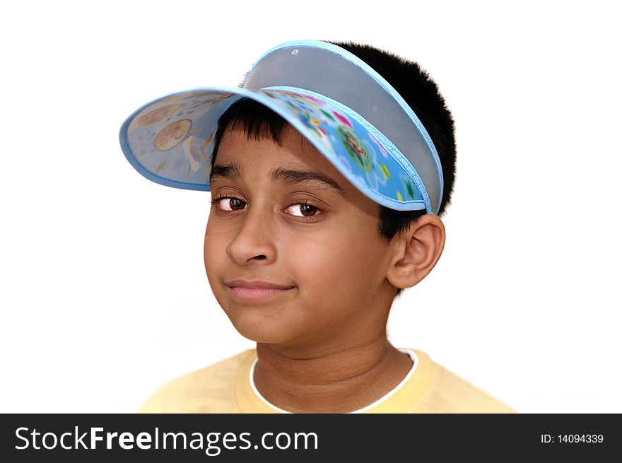 An handsome Indian kid smiling at the camera. An handsome Indian kid smiling at the camera