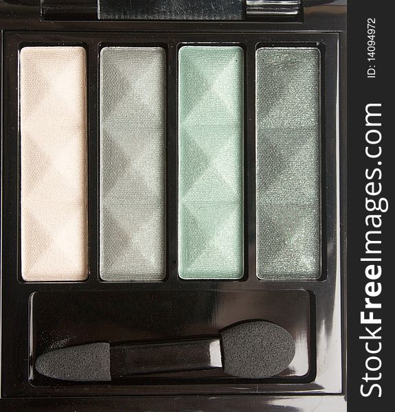 Eyeshadow Palette of four colores in black container