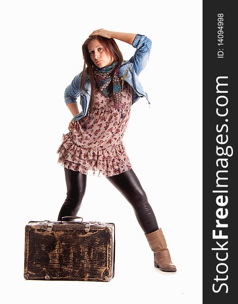 Girl with baggage on white background photo