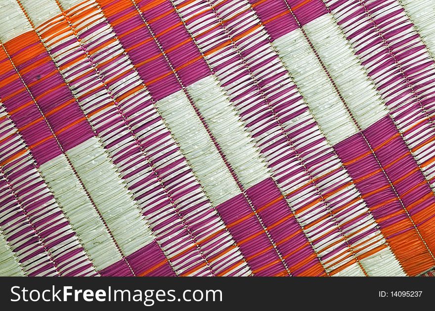 A close up shot of patterns in a jute mat