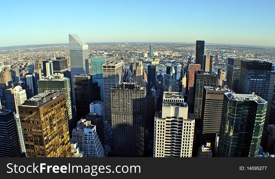 An aerial view of the buildings of the midtown Manhattan and Queens skyline. . An aerial view of the buildings of the midtown Manhattan and Queens skyline.